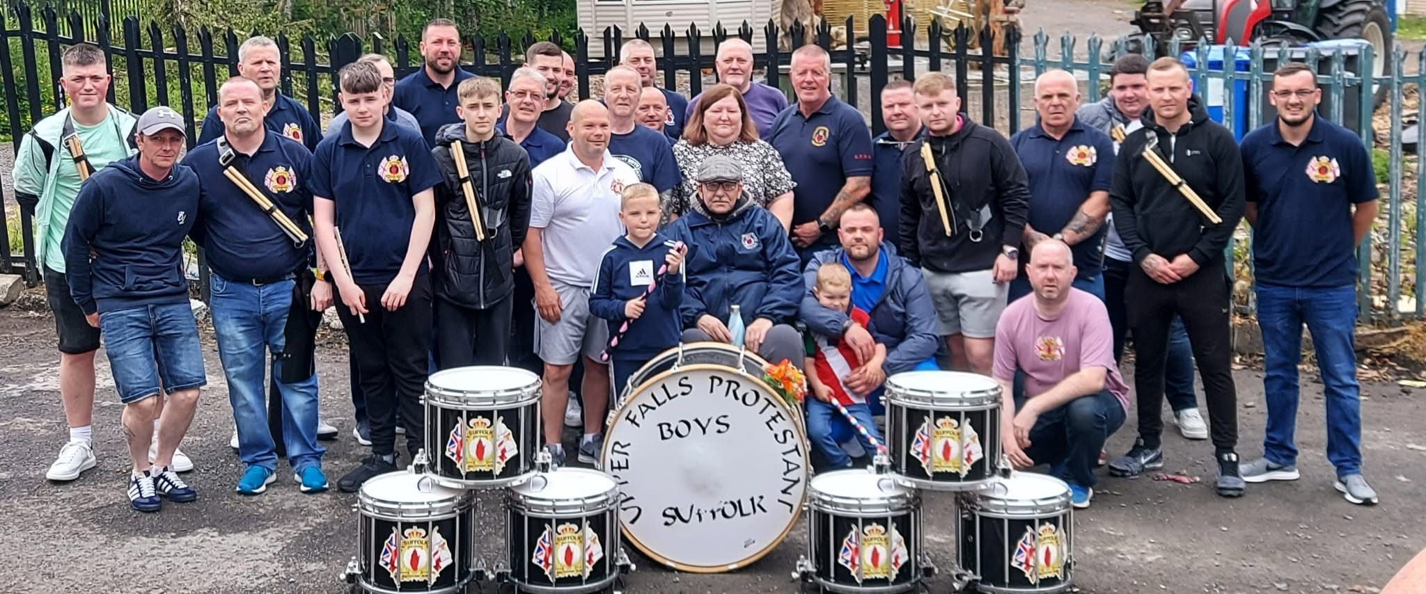 Upper Falls Protestant Boys Flute Band group photograph with their drums